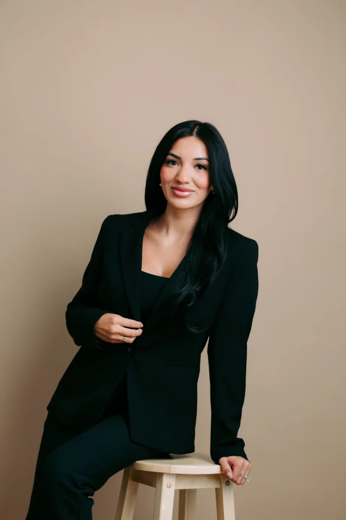 a woman in a black suit